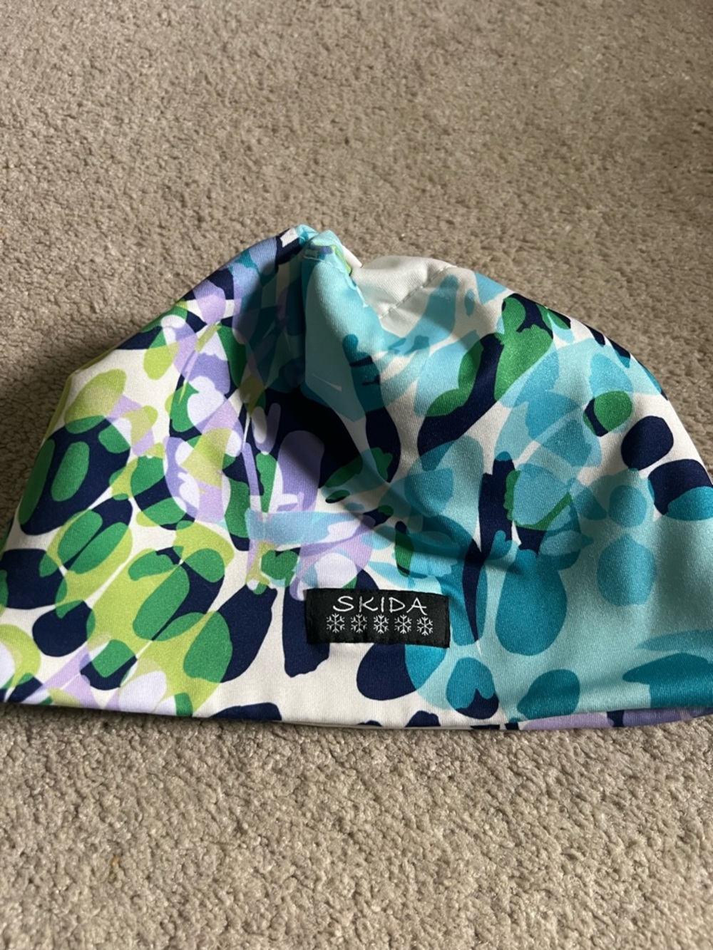Skida Women's Floral Aqua & Navy Nordic Beanie, gently used